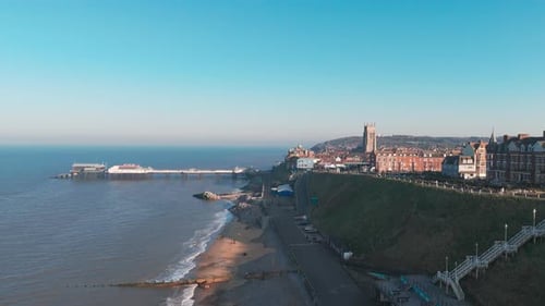 Aerial view of Cromer Pier and Norfolk coastline on a bright and clear day