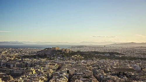 Timelapse of Acropolis of Athens, Greece, with the Parthenon Temple on top of the hill in distance