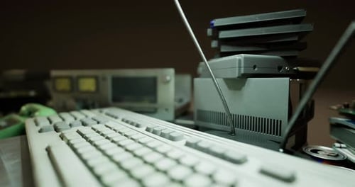 Old Technology Workshop Filled with Vintage Computers and Nostalgic Gadgets