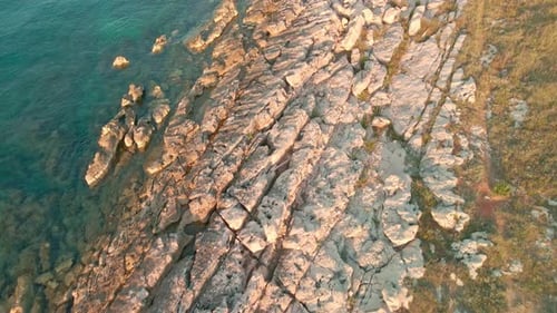 Rugged Coastline With Clear Water During Summer Of Sunset In North Croatia. Aerial Drone Shot