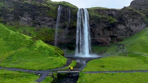 Majestic Waterfall Landscape with Lush Greenery