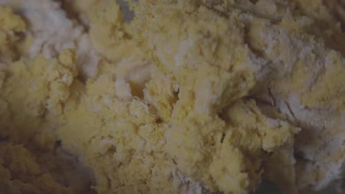 Mixing Dough in a Bowl, Close Up