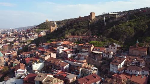 Aerial View of Historic City with Hilltop Fortress