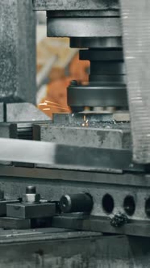 Precision metal milling in industrial workshop