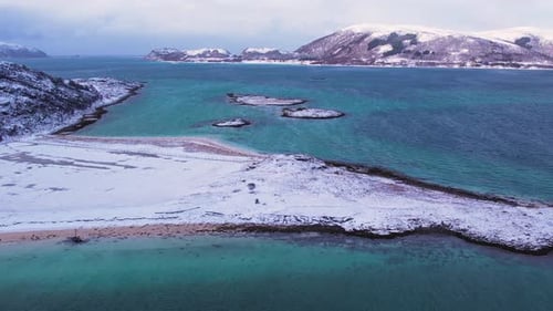 Aerial View of Sand Beach on Sunny Winter Sommaroy Island Norway