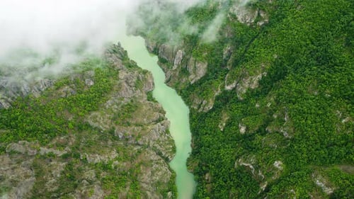 River in Summer Mountain Forest Top Down Aerial View Fly Over Sky and Clouds Pure Nature Beautiful