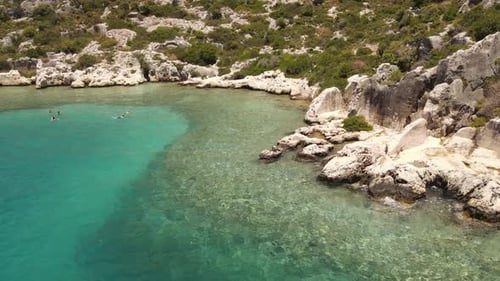 Beautiful view of the beach with boats, pure nature, sea and ships. Shot from a drone.