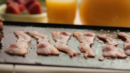 Bacon and Sausage on Grill American