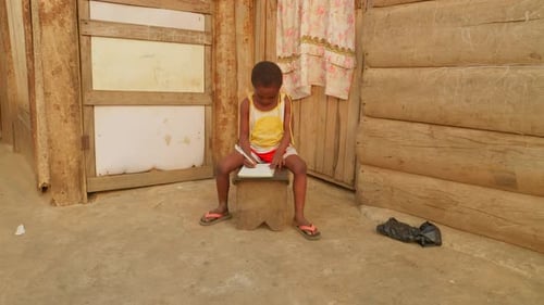 Africa school education system, black children kid student , studying alone in rural remote poor und