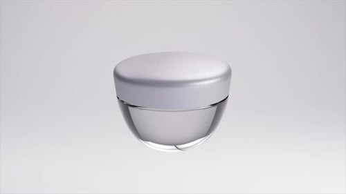 Minimalist Cosmetic Cream Jar in 3D Animation Featuring a Smooth Matte Finish and Elegant Clear Base