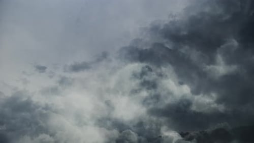 4k thunderstorm, cumulonimbus clouds in the sky moving with lightning strike