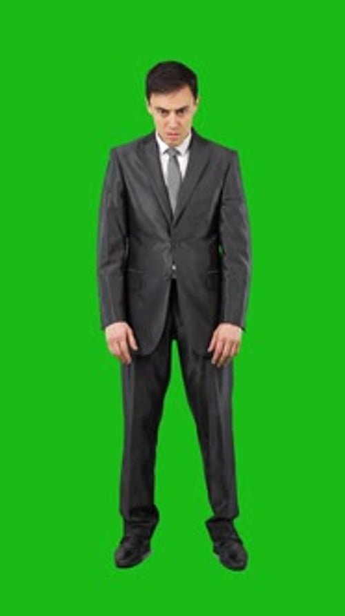 Shocked Businessman in Suit in Studio Chroma Key