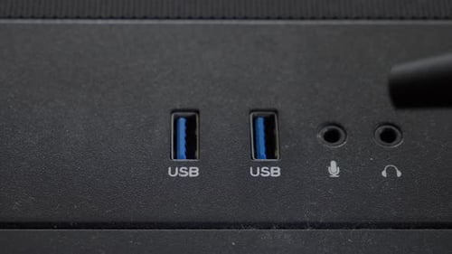 Nozzle Of Vacuum Cleaner Used In Cleaning USB Ports Of Computer. closeup shot