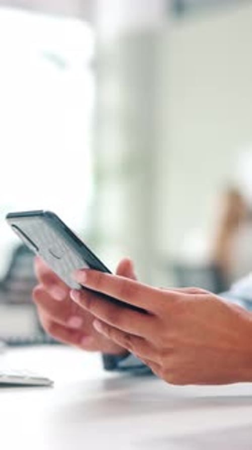 Typing, online and hands with smartphone in office or planning for investment