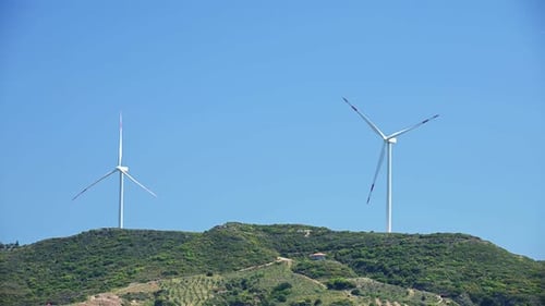 Windmill on a Hill Producing Renewable Energy