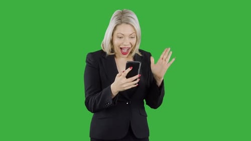 Woman Reacting to Phone on Green Screen