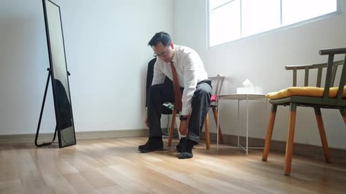 Businessman Wearing Shoes Before Go To Work