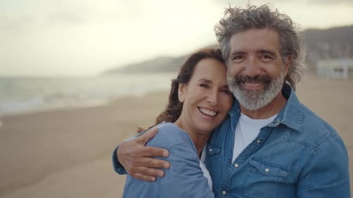 senior couple spending time on the beach