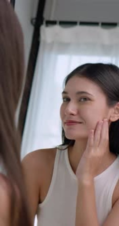Beautiful Woman in Mirror, Skin Care Routine