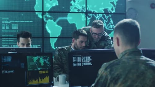 Team of Adults Collaborating in Brightly Lit Workspace