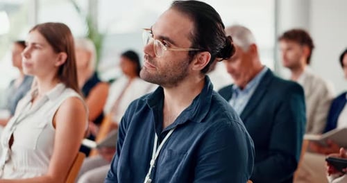 Business, seminar and man listening to training, information and learning at workshop