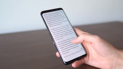 Spyware alert notification appearing on the phone while in use. Antivirus concept in action.
