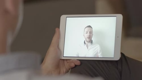 People Having A Video Call Conference Talking Together on Mobile Tablet Screen