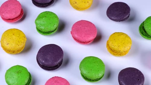 Colorful Macarons Displayed on White Background