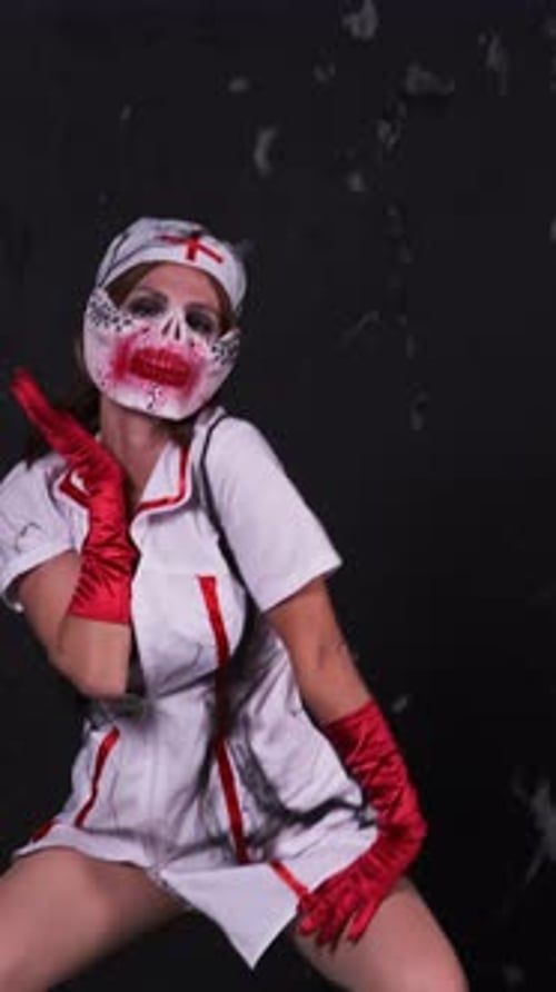 Woman Posing in Horror Nurse Costume