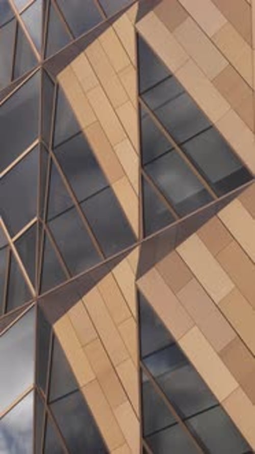 Flight Near Unusual Shaped High Business Center of a Central City District Stock Footage Bronze