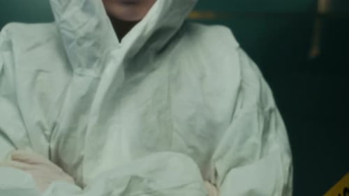 Scientist in Hazmat Suit at Crime Scene