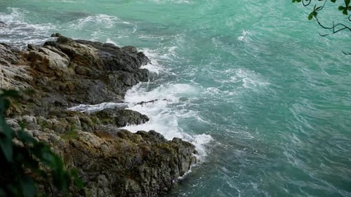 Tranquil Coastal Scene Featuring Rocky Shoreline and Gentle Waves Capturing the Serenity and Beauty