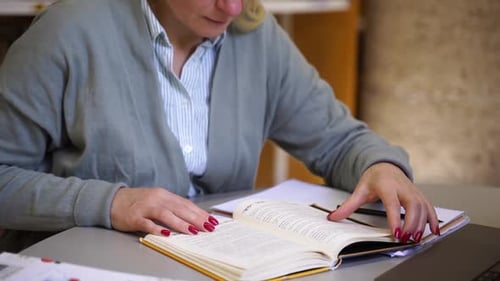 Closeup Female Hands Flipping Through Book Adult Student Reading