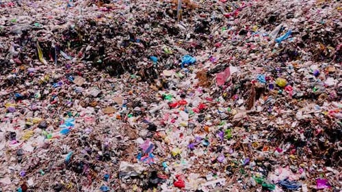 Aerial view from top of garbage dump with lot of plastic
