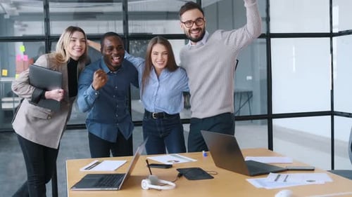 Amazing success, happy. Professional workers are in the modern office together.