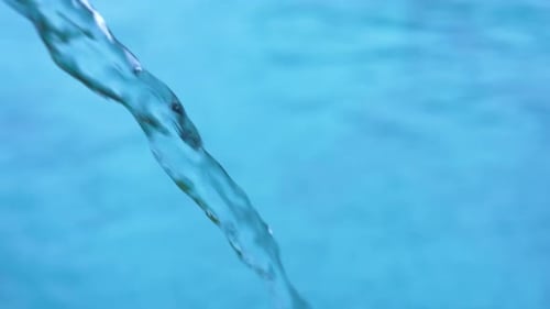 Water Flowing into Pool Close-up