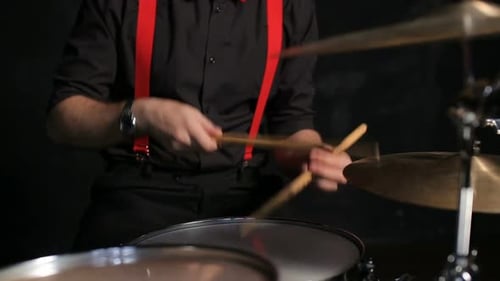 Drummer Playing the Drums