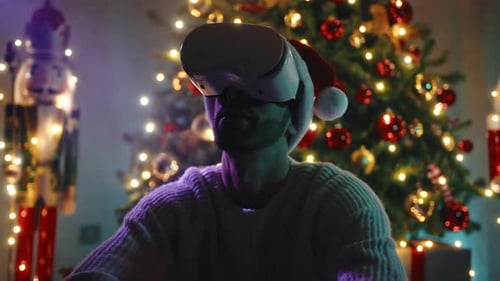 Man Wearing VR Headset in Christmas Setting