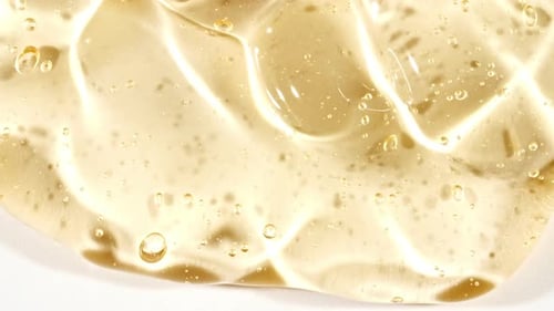 Golden Liquid Abstract Texture with Bubbles