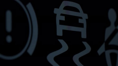 Warning Symbols Glowing on Vehicle Dashboard