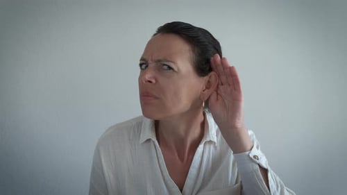 Keeping Arm Near Ear to Hear