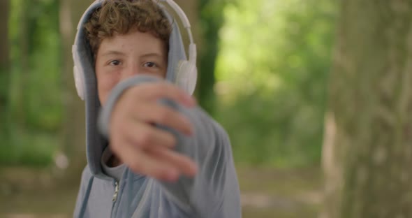 Close Up of Young Teen Boy Holding a Microphone and Rapping, People ...