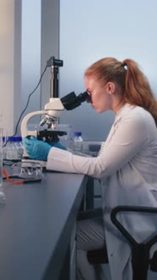Young Adult Woman Working in a Science Lab