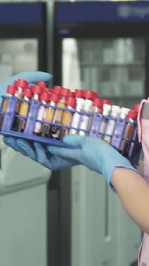 Blood Sample Vials Carried By Medical Professional
