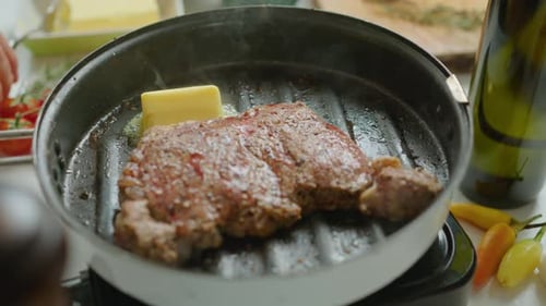 Cooking Steak in Grill Pan with Butter, Rosemary and Garlic