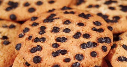 Cookies with Pieces of Dark Chocolate, Rotation. Homemade Piece Biscuit Side View Rotating Video