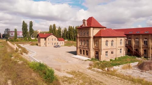 Beautiful old building in the reconstruction process. The retro look of the houses. Aerial drone foo
