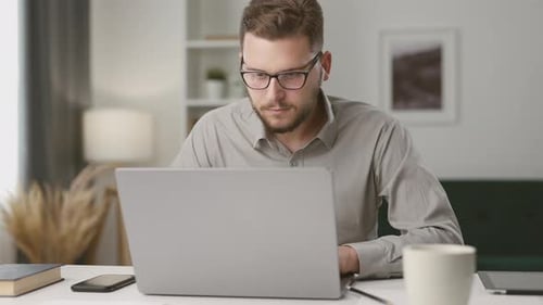 Male Student Having Remote Lecture