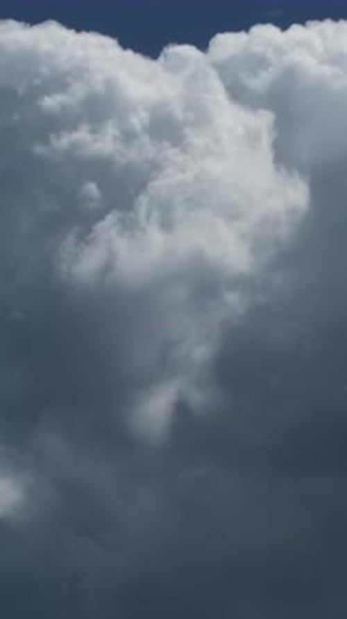 Clouds Moving in Blue Sky