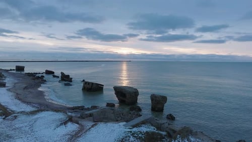Beautiful aerial establishing view of Karosta (Liepaja) concrete coast fortification ruins, vibrant